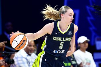 Jul 30, 2025; Arlington, Texas, USA;  Dallas Wings guard Paige Bueckers (5) dribbles against the Atlanta Dream during the first half at College Park Center. Mandatory Credit: Kevin Jairaj-Imagn Images