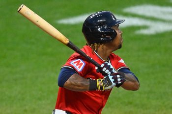 Jul 30, 2025; Cleveland, Ohio, USA; Cleveland Guardians third baseman Jose Ramirez (11) singles in the eighth inning against the Colorado Rockies at Progressive Field. Mandatory Credit: David Richard-Imagn Images