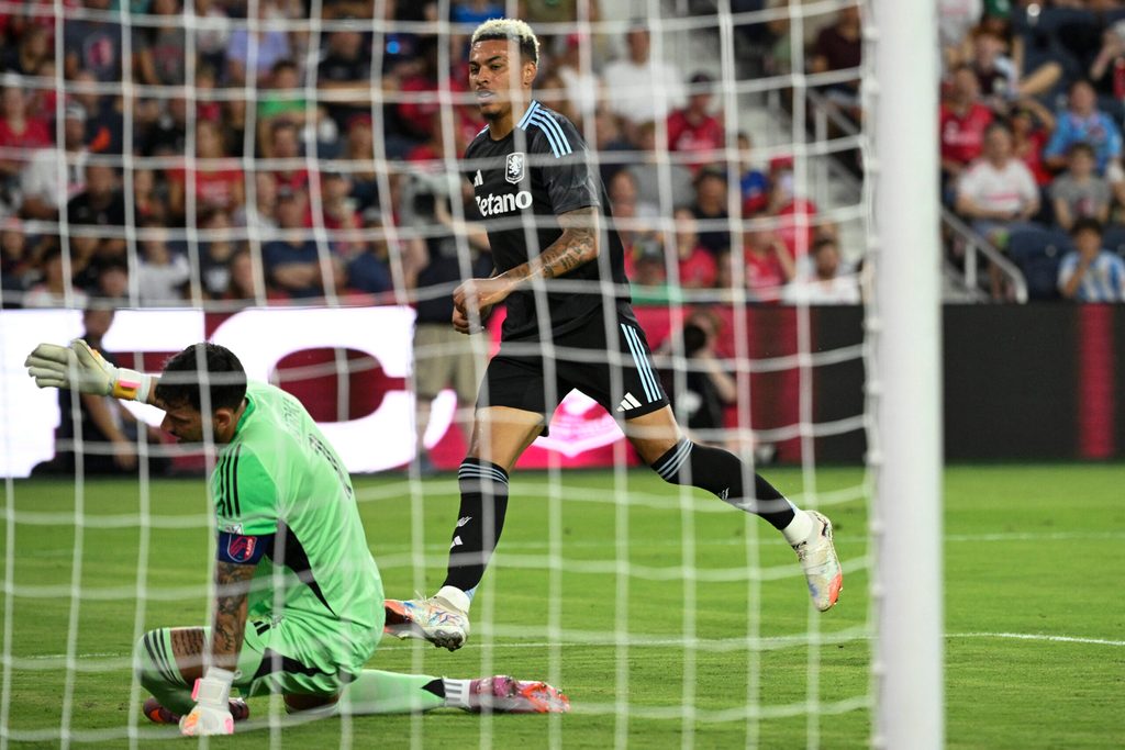 Jul 30, 2025; St. Louis, Missouri, USA; Aston Villa midfielder Morgan Rogers (27) watches the ball go past St. Louis City goalkeeper Roman Burki (1) for a goal in the first half at Energizer Park. Mandatory Credit: Joe Puetz-Imagn Images