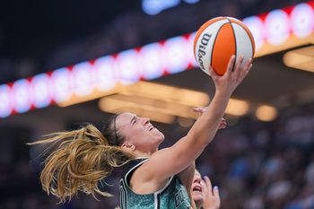 Jul 30, 2025; Minneapolis, Minnesota, USA; New York Liberty guard Sabrina Ionescu (20) shoots against the Minnesota Lynx in the fourth quarter at Target Center. Mandatory Credit: Brad Rempel-Imagn Images