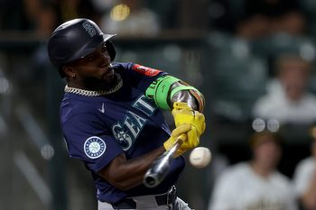 Jul 30, 2025; West Sacramento, California, USA; Seattle Mariners left fielder Randy Arozarena (56) hits a solo home run against the Athletics during the ninth inning at Sutter Health Park. Mandatory Credit: Dennis Lee-Imagn Images