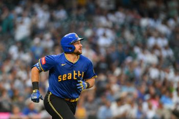 Jul 31, 2025; Seattle, Washington, USA; Seattle Mariners catcher Cal Raleigh (29) runs the bases after hitting a home run against the Texas Rangers during the fifth inning at T-Mobile Park. Mandatory Credit: Steven Bisig-Imagn Images