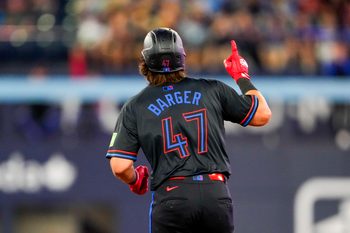 Aug 1, 2025; Toronto, Ontario, CAN; Toronto Blue Jays third base Addison Barger (47) celebrates hitting a home run against the Kansas City Royals during the ninth inning at Rogers Centre. Mandatory Credit: Kevin Sousa-Imagn Images