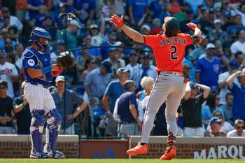 Aug 2, 2025; Chicago, Illinois, USA; Baltimore Orioles shortstop Gunnar Henderson (2) crosses home plate after hitting a three-run home run against the Chicago Cubs during the eight inning at Wrigley Field. Mandatory Credit: Kamil Krzaczynski-Imagn Images