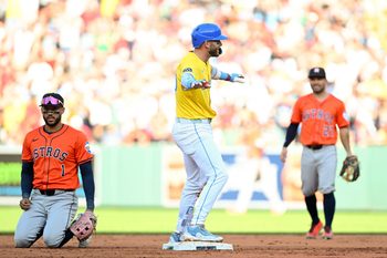 Aug 2, 2025; Boston, Massachusetts, USA; Boston Red Sox shortstop Trevor Story (10) hits a RBI double against the Houston Astros during the seventh inning at Fenway Park. Mandatory Credit: Brian Fluharty-Imagn Images