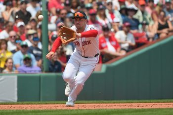 Aug 3, 2025; Boston, Massachusetts, USA; Boston Red Sox third baseman Alex Bregman (2) fields the ball during the sixth inning against the Houston Astros at Fenway Park. Mandatory Credit: Bob DeChiara-Imagn Images