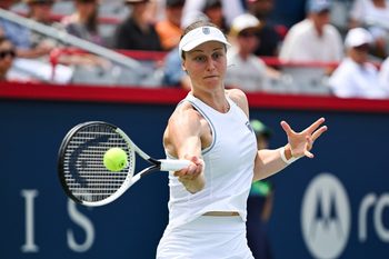 Jul 30, 2025; Montreal, QC, Canada; Liudmila Samsonova returns the ball to Naomi Osaka (JPN) in second round play at IGA Stadium. Mandatory Credit: David Kirouac-Imagn Images