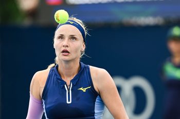 Jul 30, 2025; Montreal, QC, Canada; Rebecca Sramkova (SVK) looks at a ball against Caty Mcnally (USA) in second round play at IGA Stadium. Mandatory Credit: David Kirouac-Imagn Images