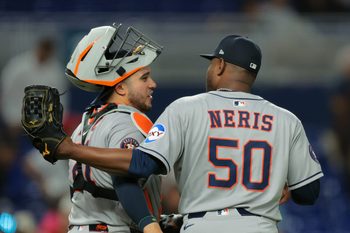 Aug 4, 2025; Miami, Florida, USA; Houston Astros relief pitcher Hector Neris (50) celebrates with catcher Yainer Diaz (21) after the game against the Miami Marlins at loanDepot Park. Mandatory Credit: Sam Navarro-Imagn Images