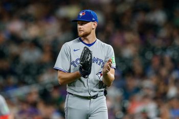 Aug 4, 2025; Denver, Colorado, USA; Toronto Blue Jays starting pitcher Eric Lauer (56) reacts at the end of the sixth inning against the Colorado Rockies at Coors Field. Mandatory Credit: Isaiah J. Downing-Imagn Images