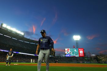Aug 4, 2025; Anaheim, California, USA;  Tampa Bay Rays second baseman Ha-Seong Kim (7) walks back to the dugout between the fourth inning against the Los Angeles Angels at Angel Stadium. Mandatory Credit: Kiyoshi Mio-Imagn Images