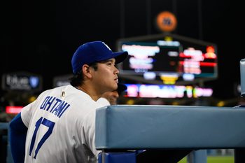 Aug 5, 2025; Los Angeles, California, USA; Los Angeles Dodgers designated hitter Shohei Ohtani (17) looks on from the dugout during the ninth inning against the St. Louis Cardinals at Dodger Stadium. Mandatory Credit: William Liang-Imagn Images