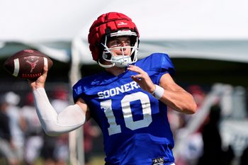 Oklahoma's John Mateer throws a pass during football practice for the University of Oklahoma Sooners in Norman, Okla., Wednesday, Aug., 6, 2025.