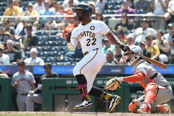 Aug 6, 2025; Pittsburgh, Pennsylvania, USA;  Pittsburgh Pirates designated hitter Andrew McCutchen (22) hits a single against the San Francisco Giants during the eighth inning at PNC Park. Mandatory Credit: Charles LeClaire-Imagn Images