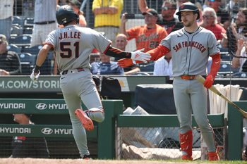 Aug 6, 2025; Pittsburgh, Pennsylvania, USA;  San Francisco Giants catcher Patrick Bailey (right) greets center fielder Jung Hoo Lee (51) crossing home plate to score the game winning run against the Pittsburgh Pirates during the ninth inning at PNC Park. Mandatory Credit: Charles LeClaire-Imagn Images