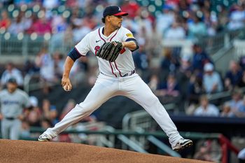 Aug 7, 2025; Cumberland, Georgia, USA; Atlanta Braves starting pitcher Carlos Carrasco (59) pitches against Miami Marlins during the first inning at Truist Park. Mandatory Credit: Dale Zanine-Imagn Images