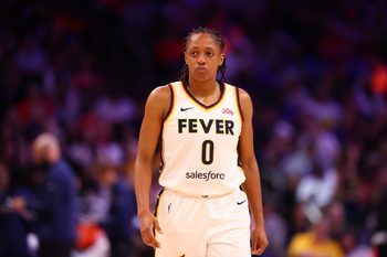 Aug 7, 2025; Phoenix, Arizona, USA; Indiana Fever guard Kelsey Mitchell (0) against the Phoenix Mercury during an WNBA game at PHX Arena. Mandatory Credit: Mark J. Rebilas-Imagn Images