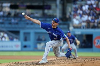 Aug 9, 2025; Los Angeles, California, USA;  Toronto Blue Jays starting pitcher Chris Bassitt (40) pitches during the fourth inning against the Los Angeles Dodgers at Dodger Stadium. Mandatory Credit: Kiyoshi Mio-Imagn Images