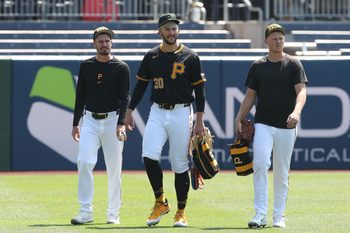 Aug 10, 2025; Pittsburgh, Pennsylvania, USA;  Pittsburgh Pirates pitchers Andrew Heaney (left) and Paul Skenes (30) and Mitch Keller (right) walk in from the bullpen before the game against the Cincinnati Reds at PNC Park. Mandatory Credit: Charles LeClaire-Imagn Images
