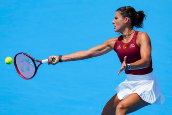 Aug 10, 2025; Cincinnati, OH, USA;  Emma Navarro (USA) returns a shot against Ella Seidel (GER) during the Cincinnati Open at the Lindner Family Tennis Center. Mandatory Credit: Aaron Doster-Imagn Images