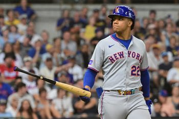 Aug 10, 2025; Milwaukee, Wisconsin, USA; New York Mets right fielder Juan Soto (22) draws a walk in the ninth inning against the Milwaukee Brewers at American Family Field. Mandatory Credit: Benny Sieu-Imagn Images