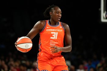 Aug 10, 2025; Las Vegas, Nevada, USA; Connecticut Sun center Tina Charles (31) dribbles the ball against the Las Vegas Aces during the first half of a WNBA basketball game at Michelob Ultra Arena. Mandatory Credit: Lucas Peltier-Imagn Images
