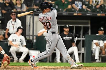 Aug 11, 2025; Chicago, Illinois, USA;  Detroit Tigers first base Spencer Torkelson (20) hits a home run during the ninth inning against the Chicago White Sox at Rate Field. Mandatory Credit: Matt Marton-Imagn Images