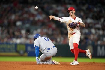 Aug 11, 2025; Anaheim, California, USA; Los Angeles Angels shortstop Zach Neto (9) forces out Los Angeles Dodgers designated hitter Shohei Ohtani (17) out at second base in the fifth inning at Angel Stadium. Mandatory Credit: Kirby Lee-Imagn Images