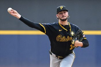Aug 12, 2025; Milwaukee, Wisconsin, USA;  Pittsburgh Pirates starting pitcher Paul Skenes (30) throws a pitch in the first inning against the Milwaukee Brewers at American Family Field. Mandatory Credit: Benny Sieu-Imagn Images