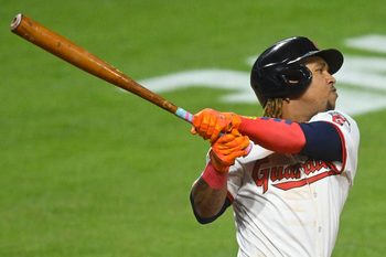 Aug 12, 2025; Cleveland, Ohio, USA; Cleveland Guardians third baseman Jose Ramirez (11) hits a solo home run in the eighth inning against the Miami Marlins at Progressive Field. Mandatory Credit: David Richard-Imagn Images