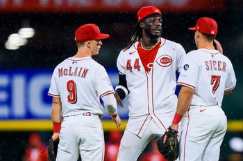 Aug 12, 2025; Cincinnati, Ohio, USA; Cincinnati Reds shortstop Elly De La Cruz (44) high fives second baseman Matt McLain (9) and first baseman Spencer Steer (7) after the victory over the Philadelphia Phillies at Great American Ball Park. Mandatory Credit: Katie Stratman-Imagn Images