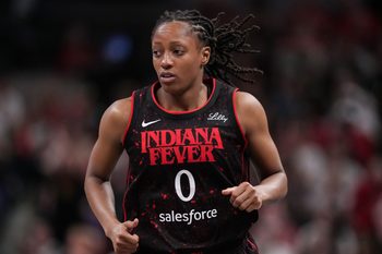 Indiana Fever guard Kelsey Mitchell (0) rushes up the court Tuesday, Aug. 12, 2025, during the game at Gainbridge Fieldhouse in Indianapolis. The Dallas Wings defeated the Indiana Fever, 81-80.