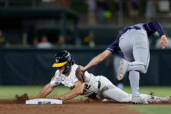 Aug 12, 2025; West Sacramento, California, USA; Athletics right fieler Colby Thomas (32) steals second base during the eighth inning against the Tampa Bay Rays at Sutter Health Park. Mandatory Credit: Sergio Estrada-Imagn Images