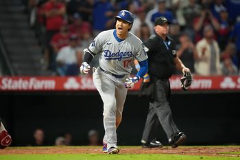 Aug 12, 2025; Anaheim, California, USA; Los Angeles Dodgers designated hitter Shohei Ohtani (17) reacts after hitting a home run in the ninth inning against the Los Angeles Angels at Angel Stadium. Mandatory Credit: Kirby Lee-Imagn Images