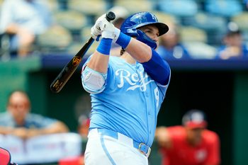 Aug 13, 2025; Kansas City, Missouri, USA; Kansas City Royals first baseman Vinnie Pasquantino (9) hits a home run during the fourth inning against the Washington Nationals at Kauffman Stadium. Mandatory Credit: Jay Biggerstaff-Imagn Images