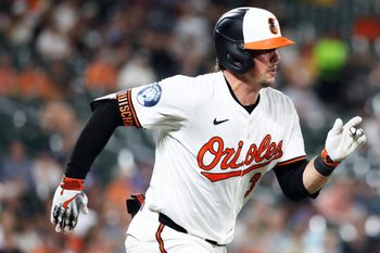 Aug 13, 2025; Baltimore, Maryland, USA; Baltimore Orioles catcher Adley Rutschman (35) runs to first during the second inning against the Seattle Mariners at Oriole Park at Camden Yards. Mandatory Credit: Daniel Kucin Jr.-Imagn Images