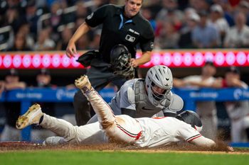 Aug 14, 2025; Minneapolis, Minnesota, USA; Detroit Tigers catcher Dillon Dingler (13) tags out Minnesota Twins left fielder Alan Roden (19) at home plate in the tenth inning at Target Field. Mandatory Credit: Jesse Johnson-Imagn Images