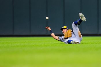 Aug 15, 2025; Cincinnati, Ohio, USA; Milwaukee Brewers outfielder Sal Frelick (10) tosses the ball after catching a fly out hit by Cincinnati Reds catcher Tyler Stephenson (not pictured) in the fifth inning at Great American Ball Park. Mandatory Credit: Katie Stratman-Imagn Images