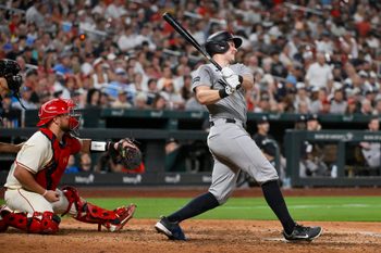 Aug 16, 2025; St. Louis, Missouri, USA;  New York Yankees first baseman Ben Rice (22) hits a three run double against the St. Louis Cardinals during the sixth inning at Busch Stadium. Mandatory Credit: Jeff Curry-Imagn Images