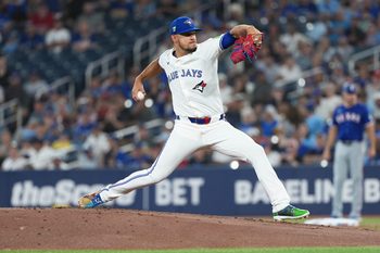 Aug 17, 2025; Toronto, Ontario, CAN; Toronto Blue Jays starting pitcher Jose Berrios (17) throws a pitch against the Texas Rangers during the first inning at Rogers Centre. Mandatory Credit: Nick Turchiaro-Imagn Images