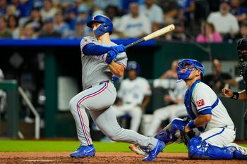Aug 18, 2025; Kansas City, Missouri, USA; Texas Rangers left fielder Wyatt Langford (36) hits a single during the sixth inning against the Kansas City Royals at Kauffman Stadium. Mandatory Credit: Jay Biggerstaff-Imagn Images
