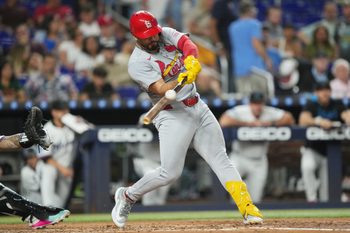 Aug 19, 2025; Miami, Florida, USA;  St. Louis Cardinals designated hitter Iván Herrera (48) singles in two runs against the Miami Marlins in the second inning at loanDepot Park. Mandatory Credit: Jim Rassol-Imagn Images