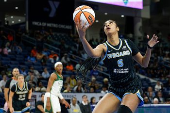 Aug 19, 2025; Chicago, Illinois, USA; Chicago Sky forward Angel Reese (5) drives to the basket against the Seattle Storm during the first half at Wintrust Arena. Mandatory Credit: Kamil Krzaczynski-Imagn Images