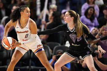 Aug 19, 2025; San Francisco, California, USA; Phoenix Mercury forward Satou Sabally (0) looks for a pass against Golden State Valkyries guard Kate Martin (20) in the fourth quarter at Chase Center. Mandatory Credit: Eakin Howard-Imagn Images