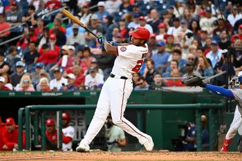 Aug 21, 2025; Washington, District of Columbia, USA; Washington Nationals designated hits a three run home run against the New York Mets during the eighth inning James Wood (29) hit at Nationals Park. Mandatory Credit: Brad Mills-Imagn Images