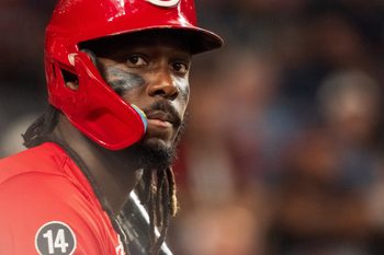 Aug 23, 2025; Phoenix, Arizona, USA; Cincinnati Reds infielder Elly De La Cruz (44) watches on from the batters box during the fourth inning against the Arizona Diamondbacks at Chase Field. Mandatory Credit: Allan Henry-Imagn Images