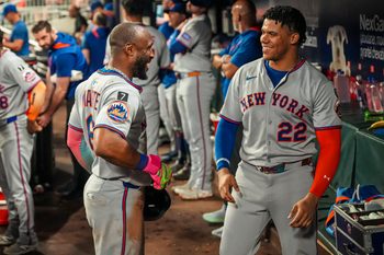 Aug 23, 2025; Cumberland, Georgia, USA; New York Mets left fielder Starling Marte reacts with right fielder Juan Soto (22) after hitting a home run against the Atlanta Braves during the seventh inning at Truist Park. Mandatory Credit: Dale Zanine-Imagn Images