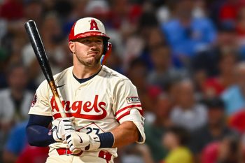 Aug 23, 2025; Anaheim, California, USA; Los Angeles Angels designated hitter Mike Trout (27) reacts after striking out against the Chicago Cubs during the sixth inning at Angel Stadium. Mandatory Credit: Jonathan Hui-Imagn Images