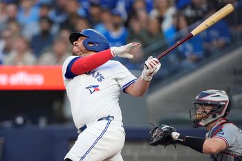 Aug 25, 2025; Toronto, Ontario, CAN; Toronto Blue Jays catcher Alejandro Kirk (30) hits a two run home run against the Minnesota Twins during the first inning at Rogers Centre. Mandatory Credit: John E. Sokolowski-Imagn Images