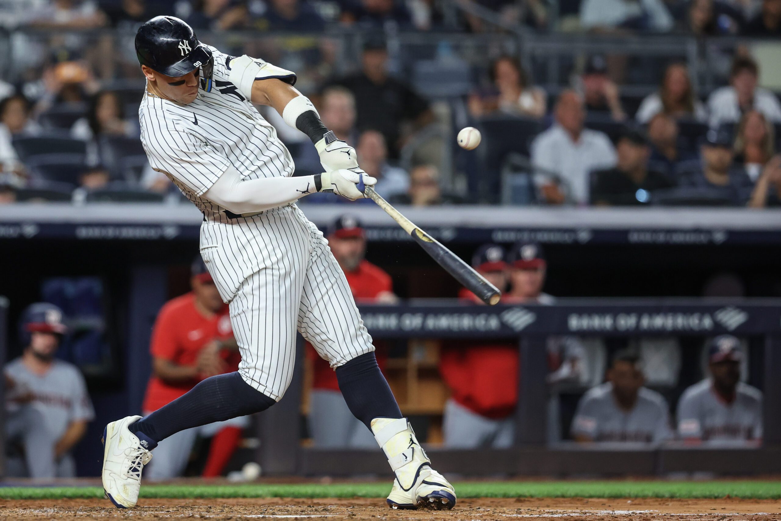 Aug 25, 2025; Bronx, New York, USA;  New York Yankees designated hitter Aaron Judge (99) hits an RBI double in the fifth inning against the Washington Nationals at Yankee Stadium. Mandatory Credit: Wendell Cruz-Imagn Images
